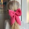 PetiteKnit December Bow jako spinka do włosów