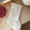 PetiteKnit Christmas Stocking wzór na świąteczną skarpetkę na słodycze